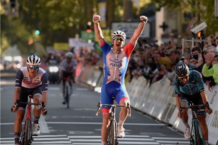 French rider of team Groupama FDJ Arnaud Demare C celebrates after crossing the finish line ahead French rider of team BB Hotels PB KTM Franck Bonnamour R and Belgian rider of team Trek Segafredo Jasper Stuyven L to win the 115th edition of the 2123 km ParisTours one day cycling race in Tours Central France on October 10 2021 Photo by GUILLAUME SOUVANT AFP Photo by GUILLAUME SOUVANTAFP via Getty Images