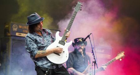 Phil Campbell takes a solo as Lemmy watches on