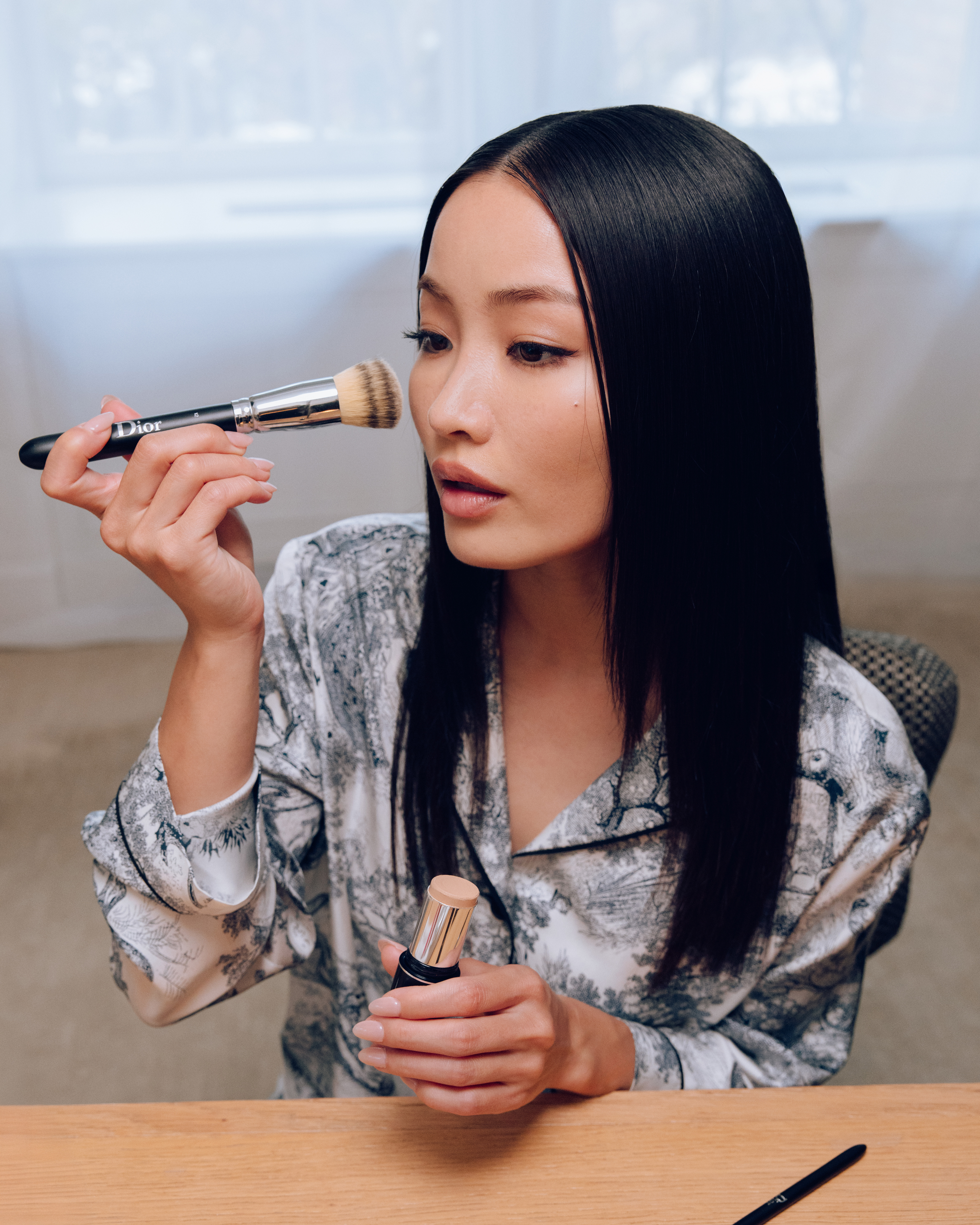 Anna Sawai getting ready for the 2025 Met Gala wearing Dior and Cartier