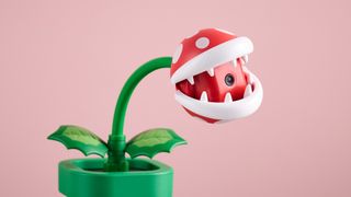 Hori Piranha Plant Camera for Nintendo Switch 2 with mouth open on pink background