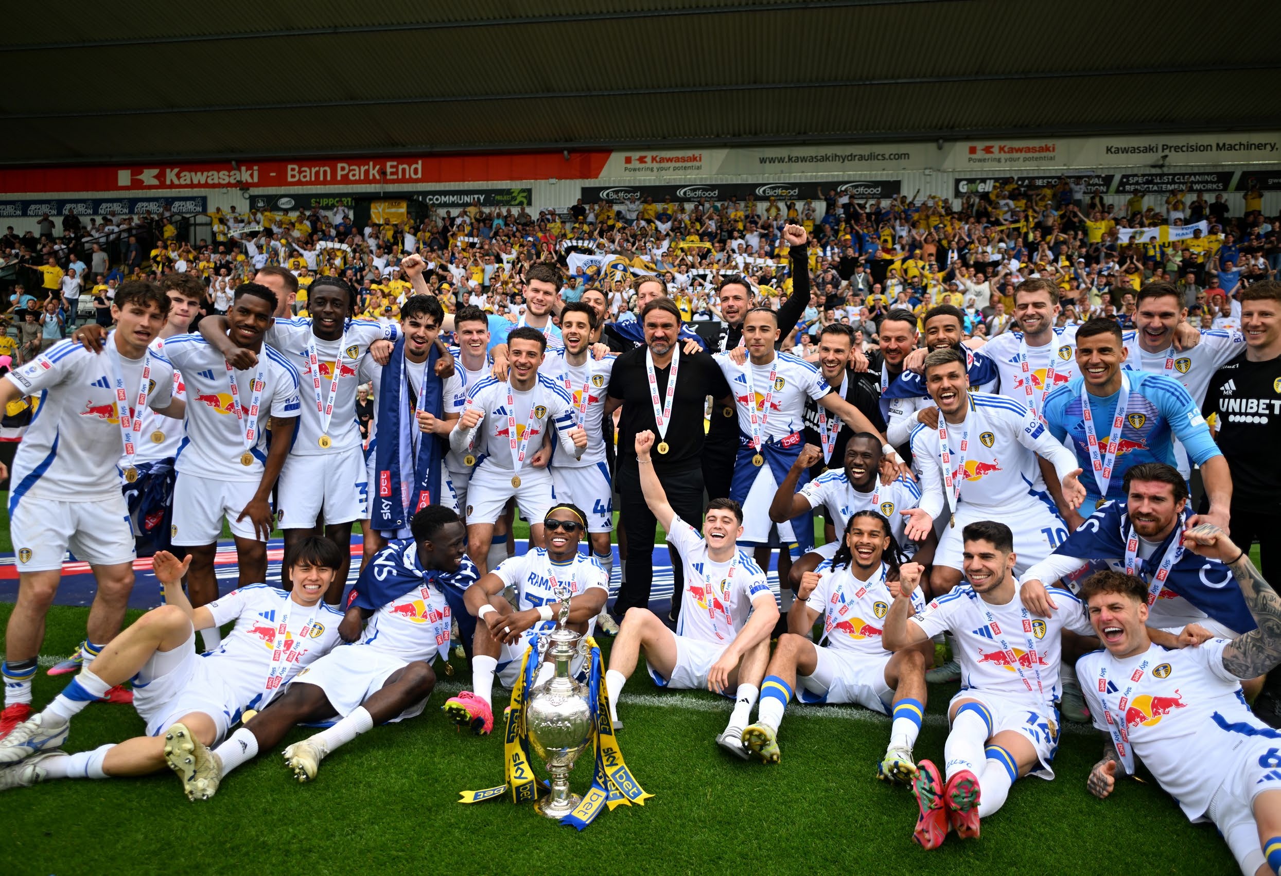 Players of Leeds United pose for a photo with the Sky Bet Championship trophy. (Photo by Harry Trump/Getty Images)