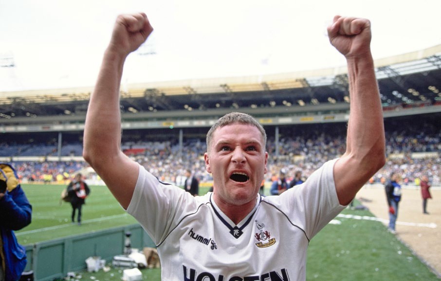 LONDON, ENGLAND - APRIL 14: Tottenham Hotspur player Paul Gascoigne celebrates in front of the Spurs fans after the 1991 FA Cup Semi Final victory against Arsenal at Wembley Stadium on April 14th, 1991 in London, United Kingdom. (Photo by Simon Bruty/Allsport/Getty Images/Hulton Archive)