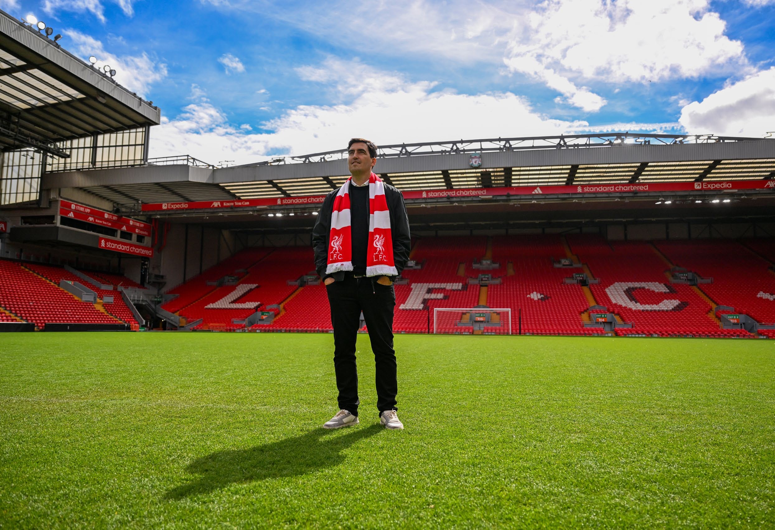Andoni Iraola stood on the pitch at Anfield. (Photo by Andrew Powell/Liverpool FC via Getty Images)