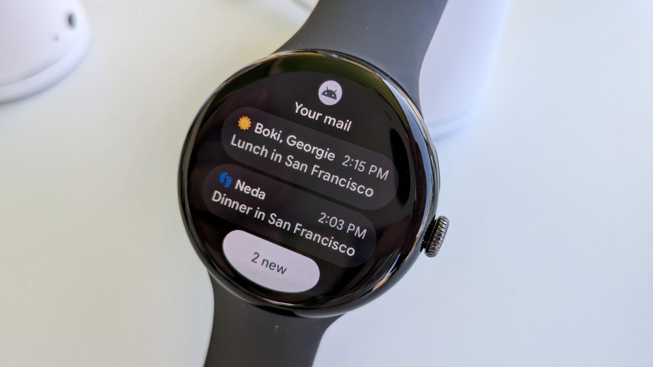 The new Gmail tile for "Your mail" on Wear OS 6 on the Pixel Watch 3, showing two emails about lunch and dinner from different contacts.