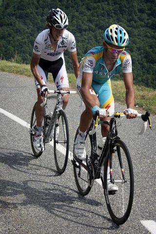 Defending Tour champion Alberto Contador leads Andy Schleck up the decisive Col de la Madeleine.