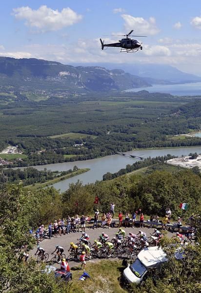 A television helicopter keeps tabs on the maillot jaune during stage 10.