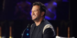 luke bryan smiling on american idol top 3 reveal