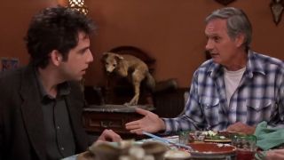 Ben Stiller and Alan Alda talking at a dinner table in Flirting With Disaster.