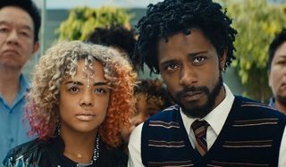 Sorry To Bother You Tessa Thompson Lakeith Stanfield staring at something displeasing