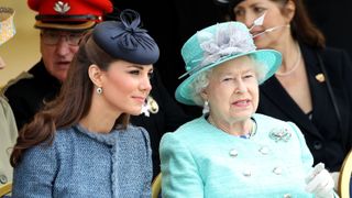 nottingham, england june 13 catherine, duchess of cambridge and queen elizabeth ii are seen talking during a visit to vernon park during a diamond jubilee visit to nottingham on june 13, 2012 in nottingham, england photo by danny martindalefilmmagic