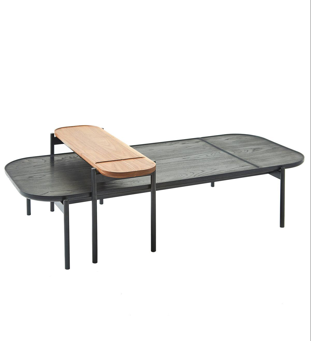 Pair of Riley tables in natural walnut and black stained oak, £2,378, Dare Studio at Aram