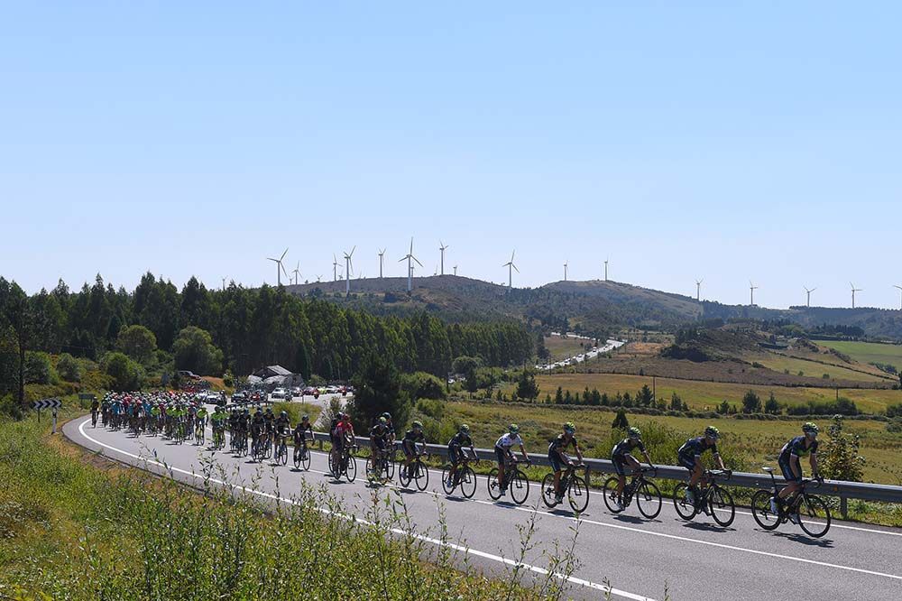 Movistar lead the peloton for much of the stage
