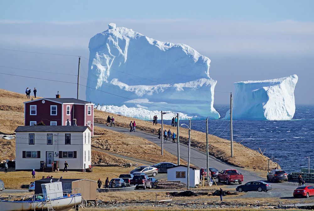 A giant iceberg drifts by &quot;Iceberg Alley&quot; near Ferryland in Newfoundland, Canada.