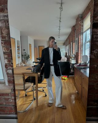 black jacket and white jeans outfit