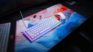 CHERRY XTRFY keyboard and mouse on a colorful mousemat