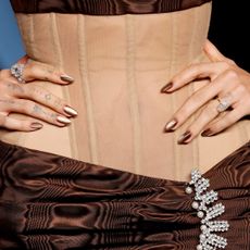 Hailey Bieber wearing a cat eye manicure at the 2025 Academy Museum Gala