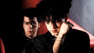 The Cure’s Lol Tolhurst and Robert Smith posing for a photograph in 1983