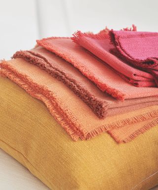 stack of colorful linen fabrics