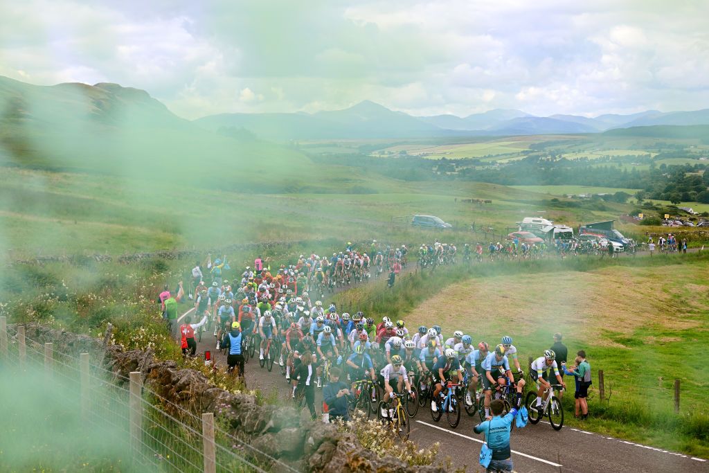 GLASGOW SCOTLAND AUGUST 06 A general view of the peloton compete climbing to the Crow road 333m during the 96th UCI Cycling World Championships Glasgow 2023 Men Elite Road Race a 2711km one day race from Edinburgh to Glasgow UCIWT on August 06 2023 in Glasgow Scotland Photo by Dario BelingheriGetty Images