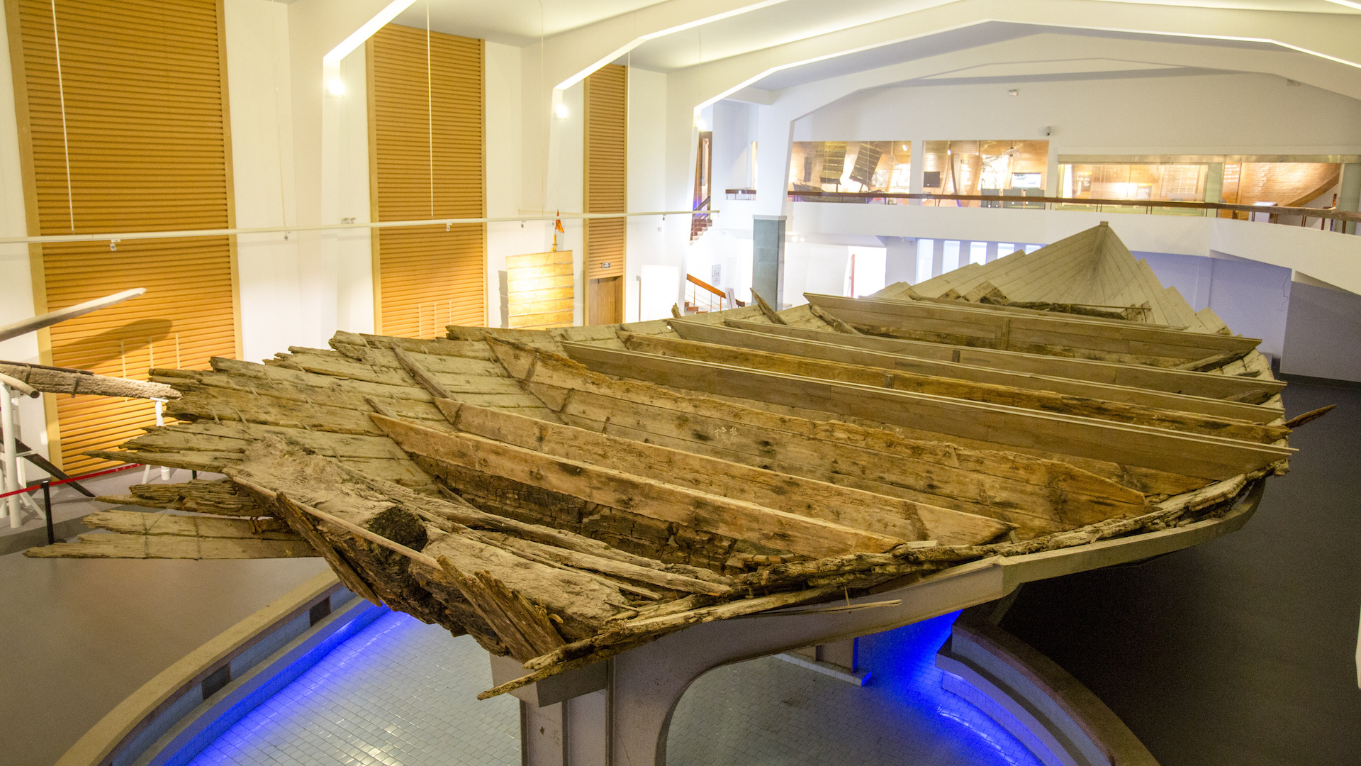 the surviving part of the Quanzhou ship displayed in a museum