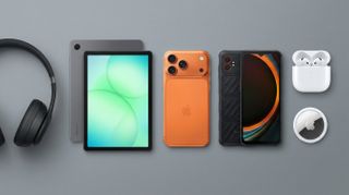 Apple and Samsung mobile devices and accessories, and a pair of Beats headphones on a professional grey background