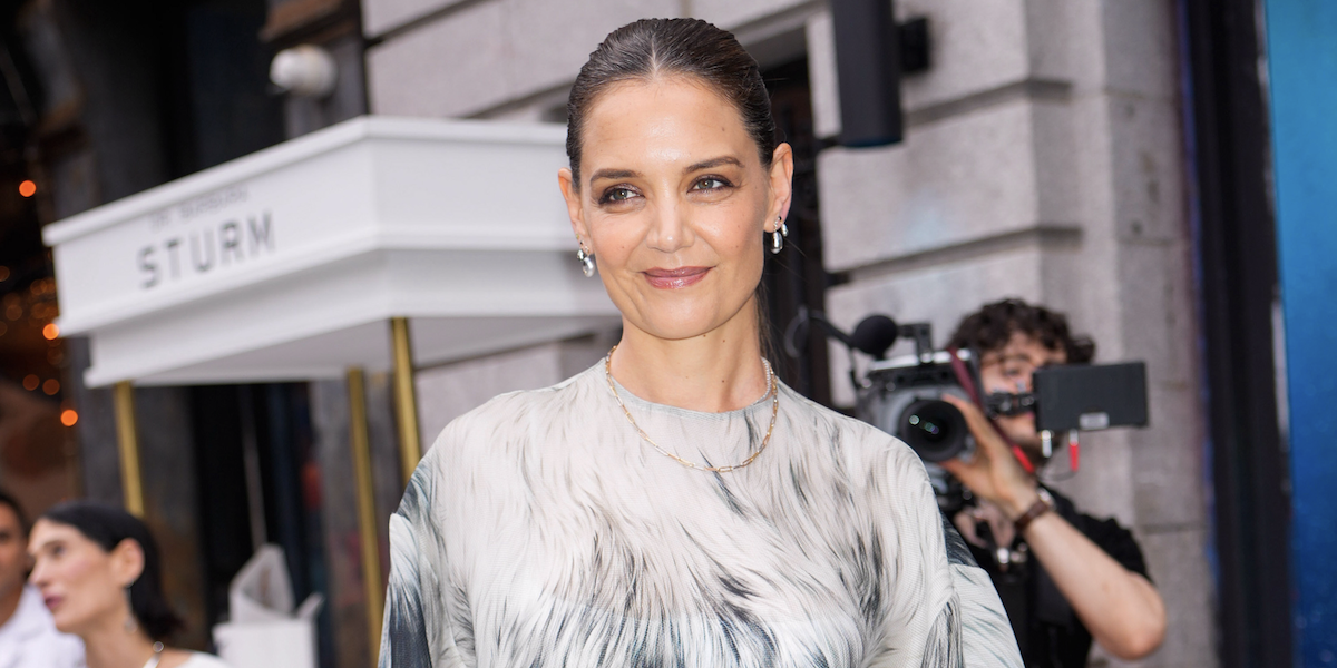 Katie Holmes at Tod's Cocktail Party held at Tod's Boutique on May 20, 2025 in New York, New York in a brown drop-waist leather dress