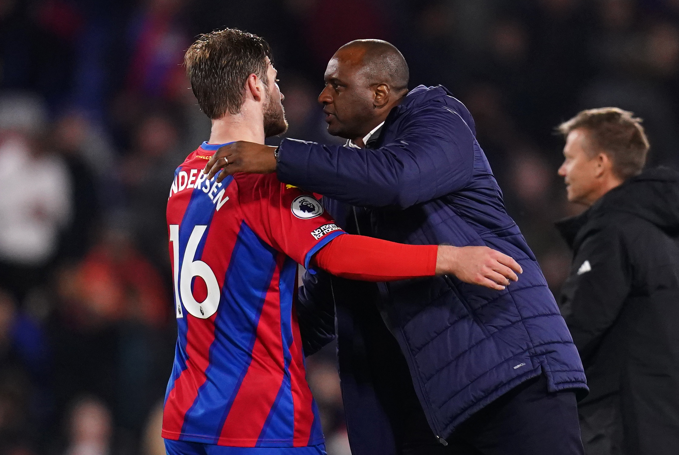 Crystal Palace’s Joachim Andersen embraces manager Patrick Vieira after the Premier League match at Selhurst Park, London. Picture date: Monday April 25, 2022