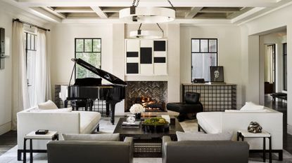 Chloe Kardashian's living room in black and white with piano