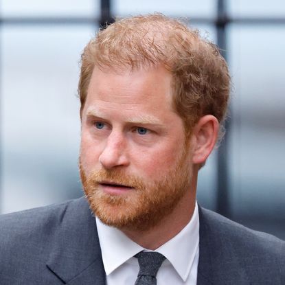Prince Harry in London wearing a suit