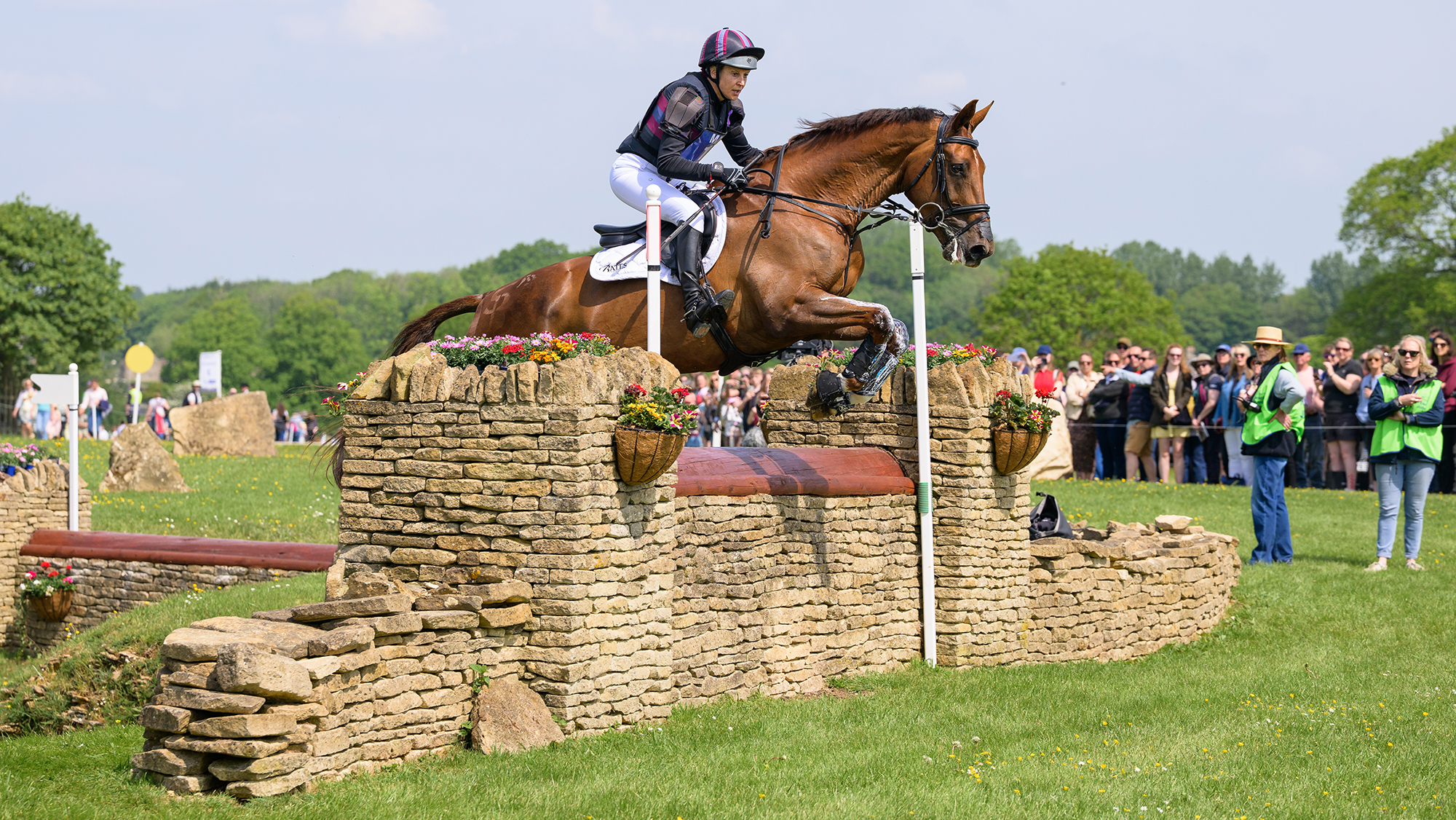Sarah Bullimore and Corimiro jump a wall at Badminton Horse Trials 2026.