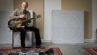 Aziz Ibrahim with his guitar collection