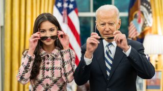 Grammys 2022 nominee and performer Olivia Rodrigo poses with US president Joe Biden
