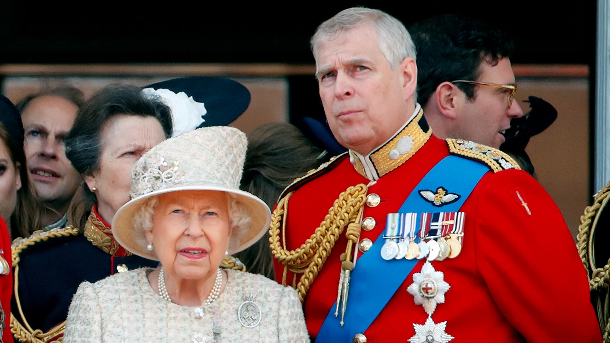 Queen Elizabeth II and Andrew (wearing the uniform of Colonel of the Grenadier Guards) watch a flypast