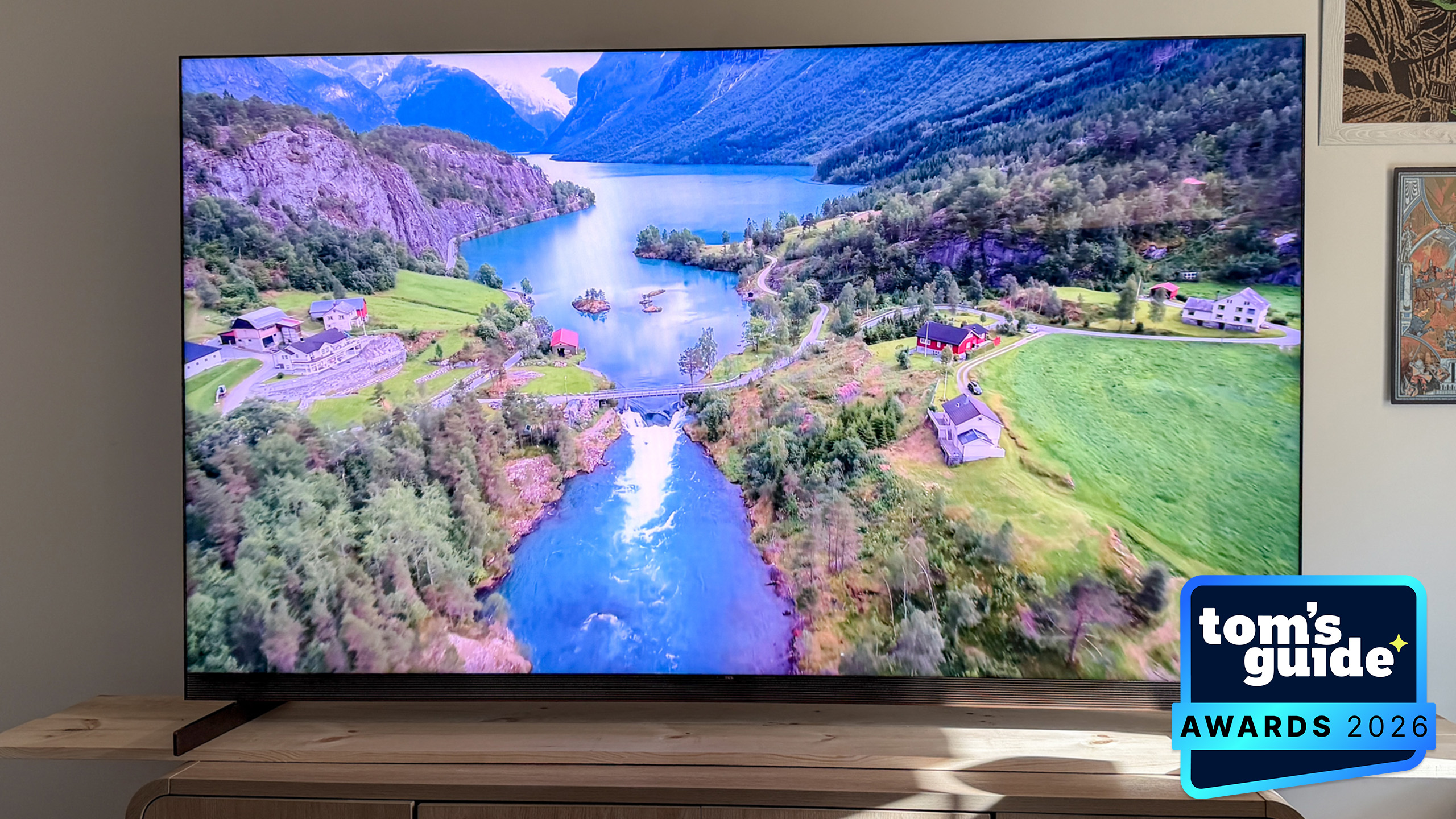 The TCL X11L with a TG Awards 2026 badge