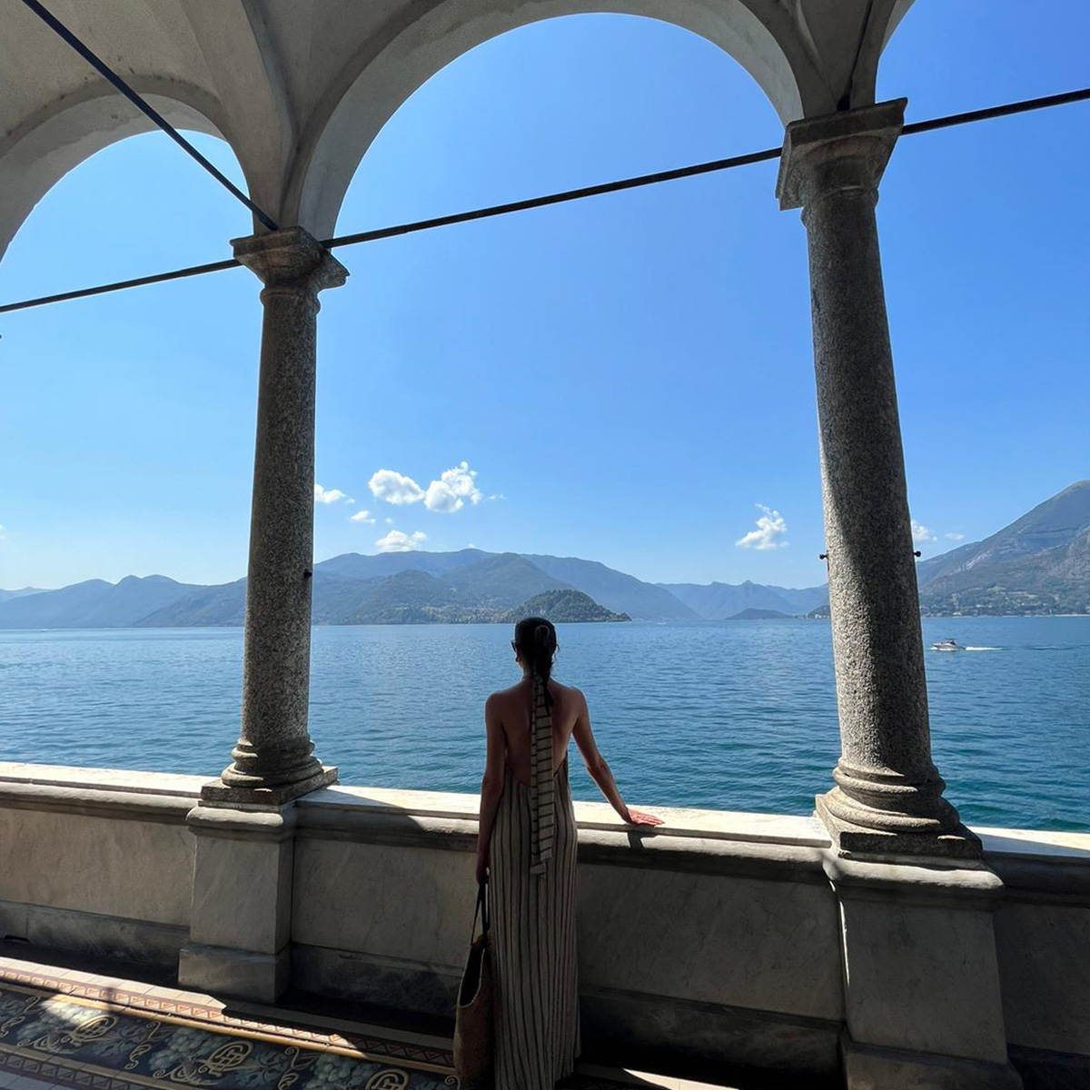Eleanor on by the water of Lake Como