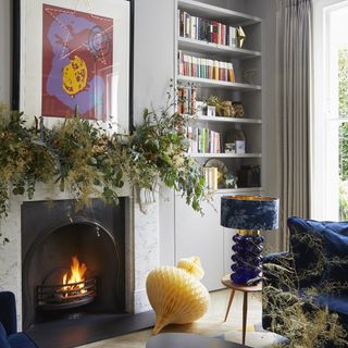 Living room with garland on fireplace