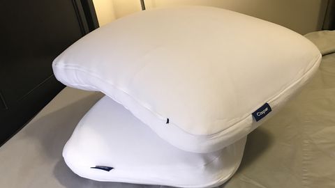 Casper Hybrid Pillow review feature image with a pair of pillows stacked on a bed
