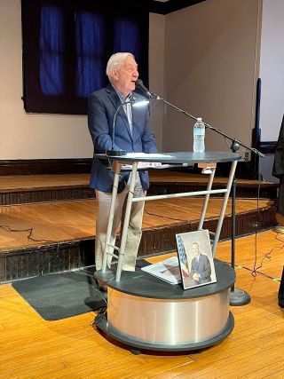 Lowell Grissom speaks at the ceremony for the NASA Ambassador of Exploration Award presented to his late brother, Virgil "Gus" Grissom, at The Space Museum in Missouri.