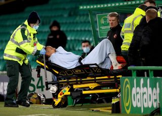 Celtic’s Christopher Jullien was stretchered off after colliding with a post