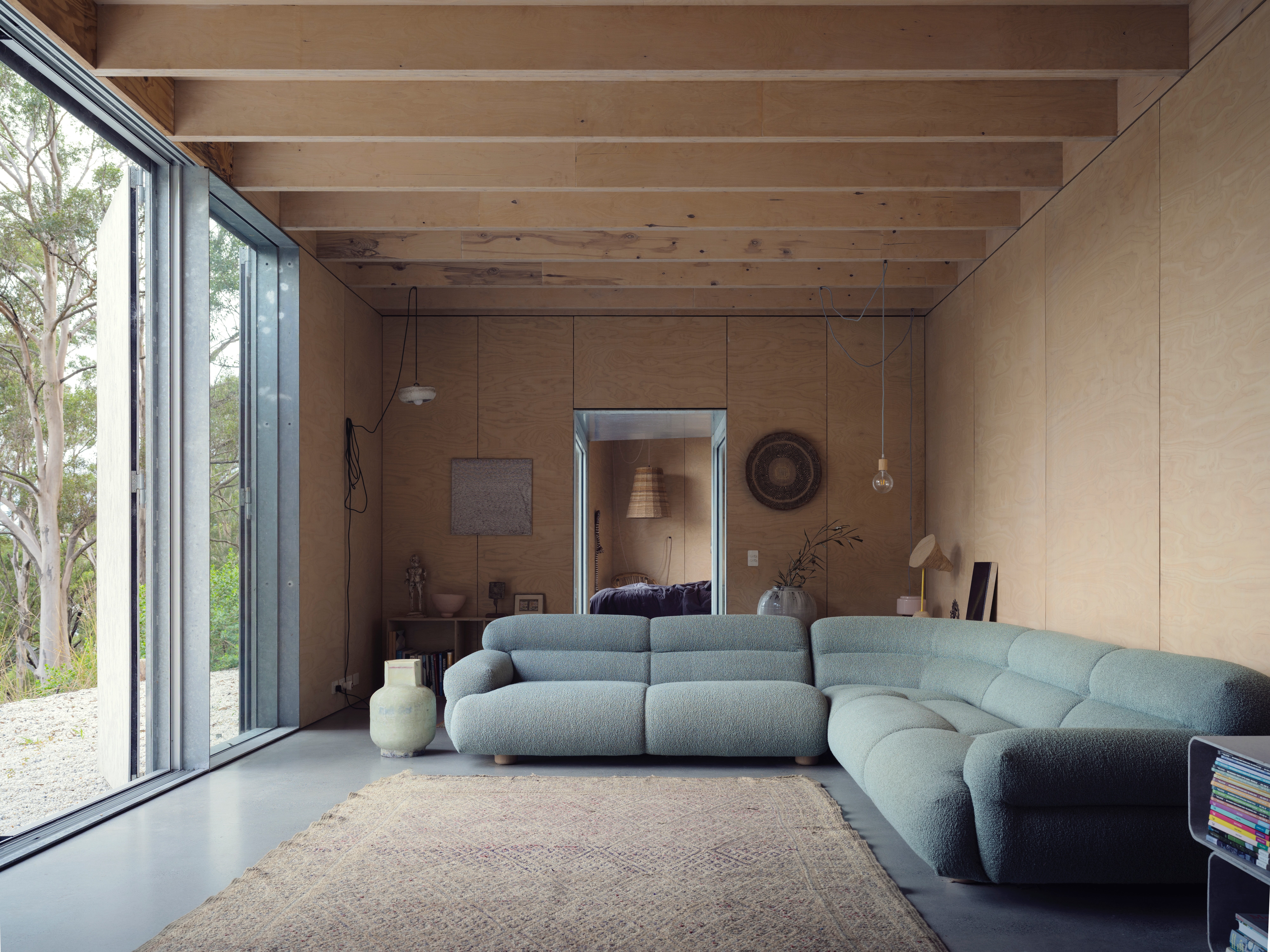 Amongst the Eucalypts, an australian holiday home fit to resist bushfires, designed as a rectangular box that seals hermetically