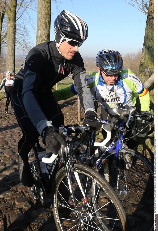 Fabian Cancellara takes a push on the Koppenberg