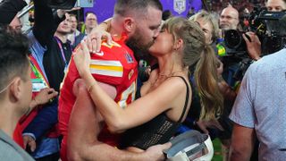 Taylor Swift and Travis Kelce kiss after the 2024 Super Bowl win