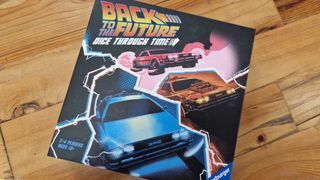Back to the Future: Dice Through Time box on a wooden surface