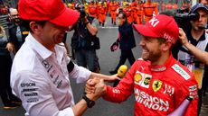 Mercedes team principal Toto Wolff and Ferrari driver Sebastian Vettel 