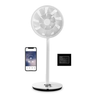 The white Duux Whisper Flex Ultimate Fan with pedestal stand and battery pack shown