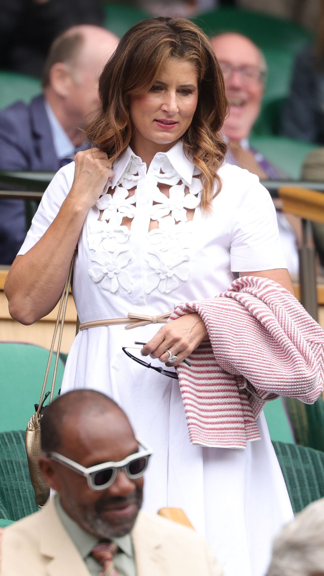 Mirka Federer wearing white Valentino midi dress at Wimbledon 2025 on July 07, 2025 in London, England