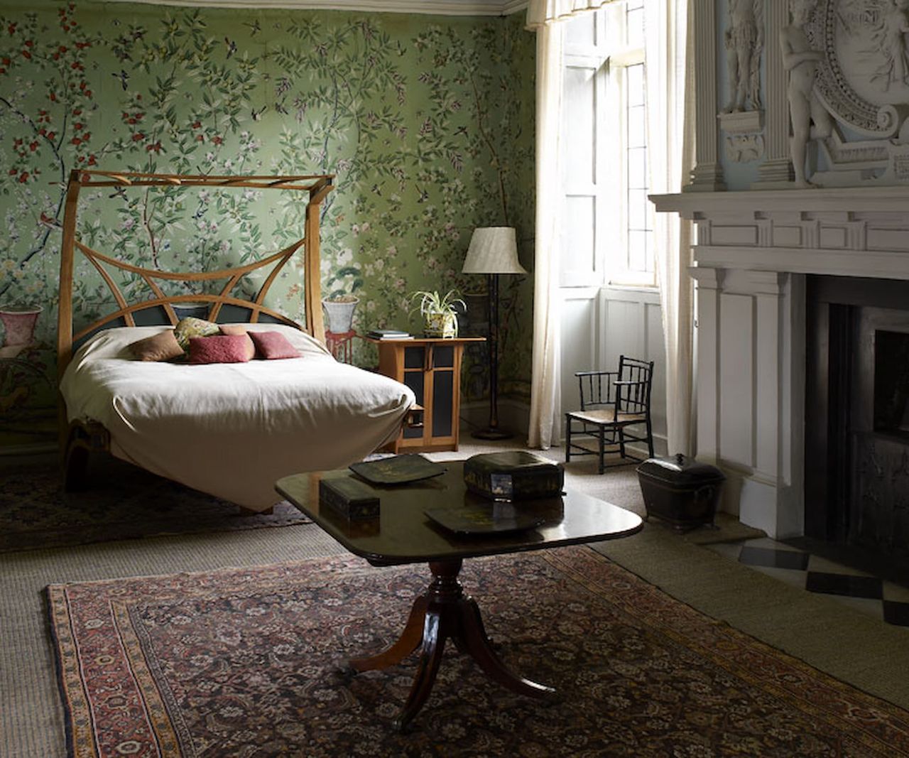 A King's Chamber bedroom with a fireplace