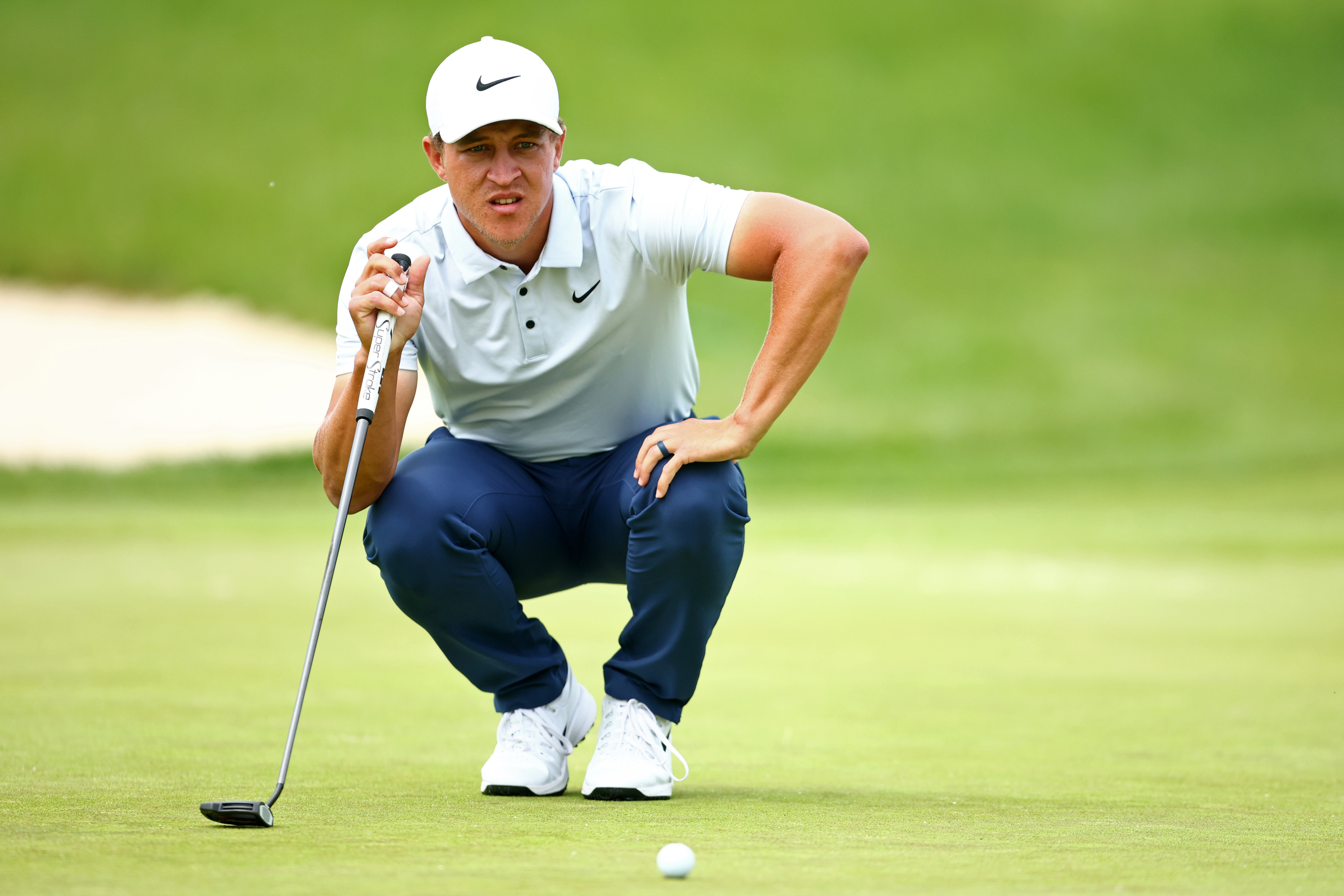 Cameron Champ lines up a putt