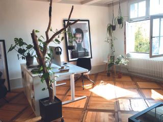 Artist in residence; a sunlit room with wooden floors