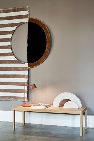 Small table with large wall art above